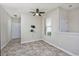 Bright bedroom with tile flooring and ample natural light from a large window at 1501 Palmina Loop # B, Myrtle Beach, SC 29588