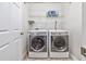 Bright laundry area with new front-loading washer and dryer, plus shelving for organized storage at 1501 Palmina Loop # B, Myrtle Beach, SC 29588