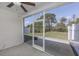 The screened-in porch has vinyl siding, a concrete slab, and is open to the backyard at 1501 Palmina Loop # B, Myrtle Beach, SC 29588
