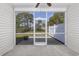 Relaxing screened porch featuring scenic views of the backyard with vinyl siding at 1501 Palmina Loop # B, Myrtle Beach, SC 29588