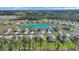 Beautiful aerial view of homes surrounding a scenic pond in a vibrant community at 156 Teddy Bear Circle, Conway, SC 29526