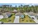 Overhead view of several homes with well-maintained yards in a suburban neighborhood at 156 Teddy Bear Circle, Conway, SC 29526