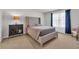Comfortable bedroom with a plush bed, carpeted floors, and plenty of natural light from the window at 156 Teddy Bear Circle, Conway, SC 29526