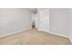 Neutral bedroom offers calm ambiance with a closet and an adjacent room entrance at 156 Teddy Bear Circle, Conway, SC 29526