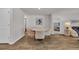 Dining area with a modern table set near the kitchen and living spaces at 156 Teddy Bear Circle, Conway, SC 29526