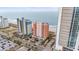 Aerial view of the buildings, beach, and ocean, capturing the prime coastal location at 1604 N Ocean Blvd. # 903, Myrtle Beach, SC 29577