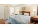Bright bedroom featuring a queen-sized bed, decorative artwork, and a closet at 1604 N Ocean Blvd. # 903, Myrtle Beach, SC 29577