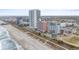 Expansive aerial view of a beachfront property with multiple buildings and ocean views at 1604 N Ocean Blvd. # 904, Myrtle Beach, SC 29577