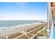 Panoramic oceanfront view from balcony showing beach and pier at 1604 N Ocean Blvd. # 904, Myrtle Beach, SC 29577