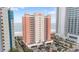 Stunning exterior shot of a beachfront condo building with multiple balconies and ocean views at 1604 N Ocean Blvd. # 904, Myrtle Beach, SC 29577