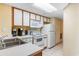 Bright kitchen featuring modern appliances, white cabinetry, and a convenient layout at 1604 N Ocean Blvd. # 904, Myrtle Beach, SC 29577