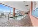 Enclosed swimming pool area with ocean views and lounge seating at 1604 N Ocean Blvd. # 904, Myrtle Beach, SC 29577