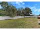 Well-maintained, fenced backyard with a combination of open grass and wooded privacy at 1794 Graham Rd., Aynor, SC 29544