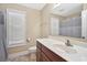 This well-lit bathroom showcases a sink with a vanity, and a large mirror at 1794 Graham Rd., Aynor, SC 29544