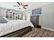 Bedroom featuring wood floor, a large bed, ceiling fan and dressers for storage at 1794 Graham Rd., Aynor, SC 29544