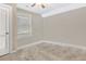 Empty bedroom featuring a window for natural light, and a ceiling fan for optimal comfort at 1794 Graham Rd., Aynor, SC 29544