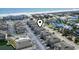 Aerial view of community with beach nearby; construction on road and parking available at 1801 N Ocean Blvd. # O-4, North Myrtle Beach, SC 29582