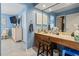 Spacious bathroom with a vanity and large mirror at 1801 N Ocean Blvd. # O-4, North Myrtle Beach, SC 29582