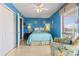 Well-decorated bedroom featuring natural light, a comfortable sitting area, and beachy accents at 1801 N Ocean Blvd. # O-4, North Myrtle Beach, SC 29582
