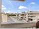 View of townhome community with ample parking, well-maintained landscaping, and a peek of golf course at 1801 N Ocean Blvd. # O-4, North Myrtle Beach, SC 29582