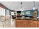 View from the kitchen island into the living room and dining area of this open-concept condo at 1801 N Ocean Blvd. # O-4, North Myrtle Beach, SC 29582