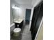 Clean bathroom with a modern vanity, a mirror, and a toilet near the door to the hall at 1891 Colony Dr. # 15E, Surfside Beach, SC 29575