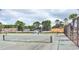 Spacious tennis courts with net and fencing, suitable for friendly matches and athletic pursuits at 1891 Colony Dr. # 15E, Surfside Beach, SC 29575