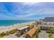 Panoramic aerial view of the beach, coastline, and nearby hotels and condos at 200 76Th Ave. N # 1211, Myrtle Beach, SC 29572