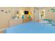 Relaxing bedroom with dresser, two beds, and beach-themed décor at 200 76Th Ave. N # 1211, Myrtle Beach, SC 29572