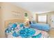 Bright bedroom with two beds, complemented by ocean-themed décor and natural lighting at 200 76Th Ave. N # 1211, Myrtle Beach, SC 29572