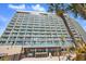Oceanfront high-rise condo resort featuring a beachfront bar with outdoor seating and multiple balconies at 201 74Th Ave. N # 1128, Myrtle Beach, SC 29572