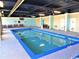 Enjoy this indoor pool with tile trim, large windows, and plenty of lounge seating at 201 74Th Ave. N # 1128, Myrtle Beach, SC 29572