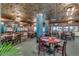 Features a restaurant with tables, chairs, and a decorative ceiling at 201 74Th Ave. N # 1128, Myrtle Beach, SC 29572