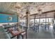 Restaurant area featuring tables and chairs with a view of the beach at 201 74Th Ave. N # 1128, Myrtle Beach, SC 29572