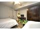 Bedroom featuring two beds, a TV, a wardrobe, and wood-look floors at 2151 Bridge View Ct. # 1-702, North Myrtle Beach, SC 29582