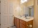 Bathroom with wood vanity, framed mirror, and good lighting fixtures at 221 Port Smith Dr. # 6, Myrtle Beach, SC 29588