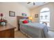 Inviting bedroom with wood bed frame, natural light, and comforting decor at 221 Port Smith Dr. # 6, Myrtle Beach, SC 29588