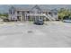 Apartment complex exterior featuring multiple units, parking, and well-maintained landscaping at 221 Port Smith Dr. # 6, Myrtle Beach, SC 29588