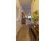 Interior hallway view with decorative console table leading to an open-concept living area and kitchen at 221 Port Smith Dr. # 6, Myrtle Beach, SC 29588