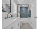 Elegant bathroom with vanity, tub and tiled shower and modern fixtures at 2309 Seaseeker Ln., Myrtle Beach, SC 29577