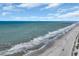 Breathtaking aerial view of a scenic beach coastline with soft sands at 2309 Seaseeker Ln., Myrtle Beach, SC 29577