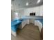 Bright kitchen featuring white cabinets, stainless steel appliances, and modern countertops at 2309 Seaseeker Ln., Myrtle Beach, SC 29577