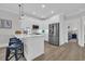 Bright and modern kitchen with stainless steel appliances and white cabinets at 2309 Seaseeker Ln., Myrtle Beach, SC 29577