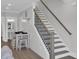 Stairway with white risers, gray treads, and a stained handrail at 2309 Seaseeker Ln., Myrtle Beach, SC 29577