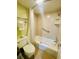 Clean bathroom features a shower and toilet with safety features and white towels at 2311 S Ocean Blvd. # 144, Myrtle Beach, SC 29577