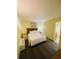 Comfortable bedroom with a queen bed next to a kitchenette at 2311 S Ocean Blvd. # 144, Myrtle Beach, SC 29577