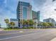 Beautiful view of Compass Cove oceanfront resort with palm trees and parking at 2311 S Ocean Blvd. # 144, Myrtle Beach, SC 29577