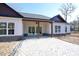 Home with a covered back patio and large backyard space at 232 Ole Maple St., Loris, SC 29569