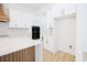 Bright kitchen with white cabinets and countertops, complemented by stainless steel appliances at 232 Ole Maple St., Loris, SC 29569