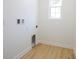 Unfinished room with hardwood flooring and unattached electrical outlets at 232 Ole Maple St., Loris, SC 29569